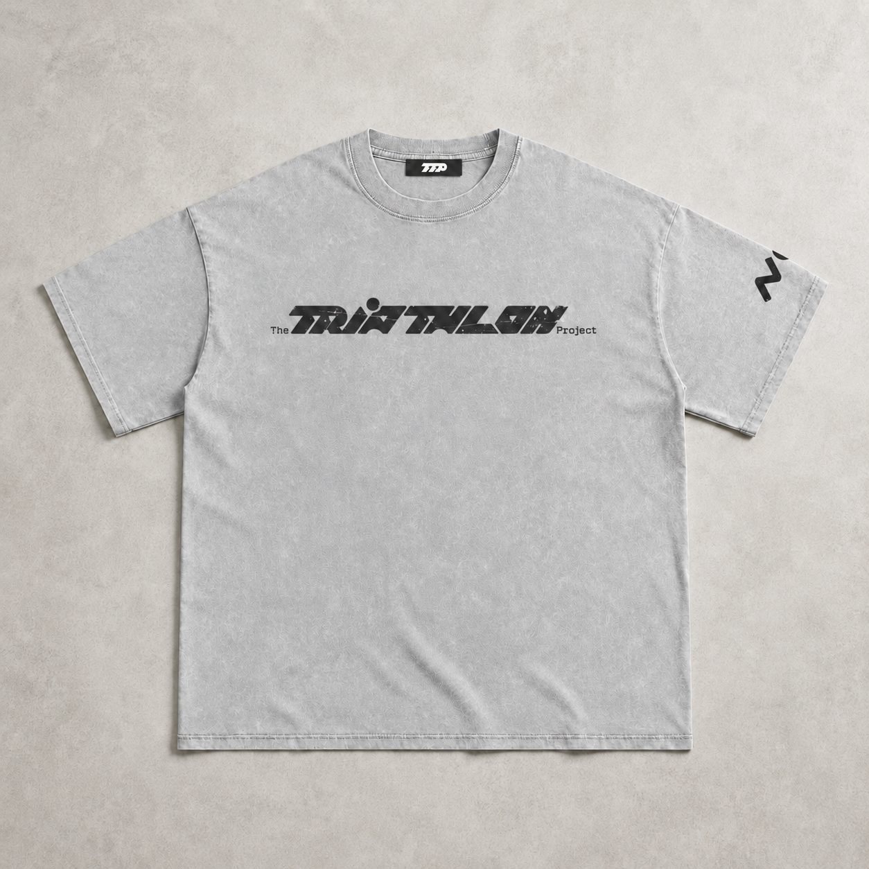Grey distressed tshirt on greige background