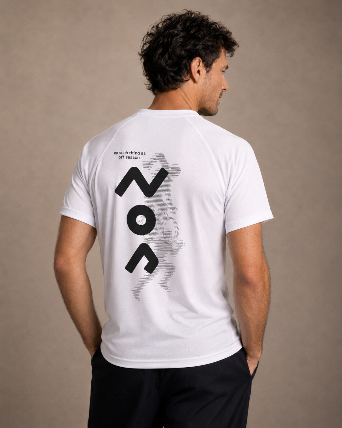 Male model wearing white athletic top with design on back