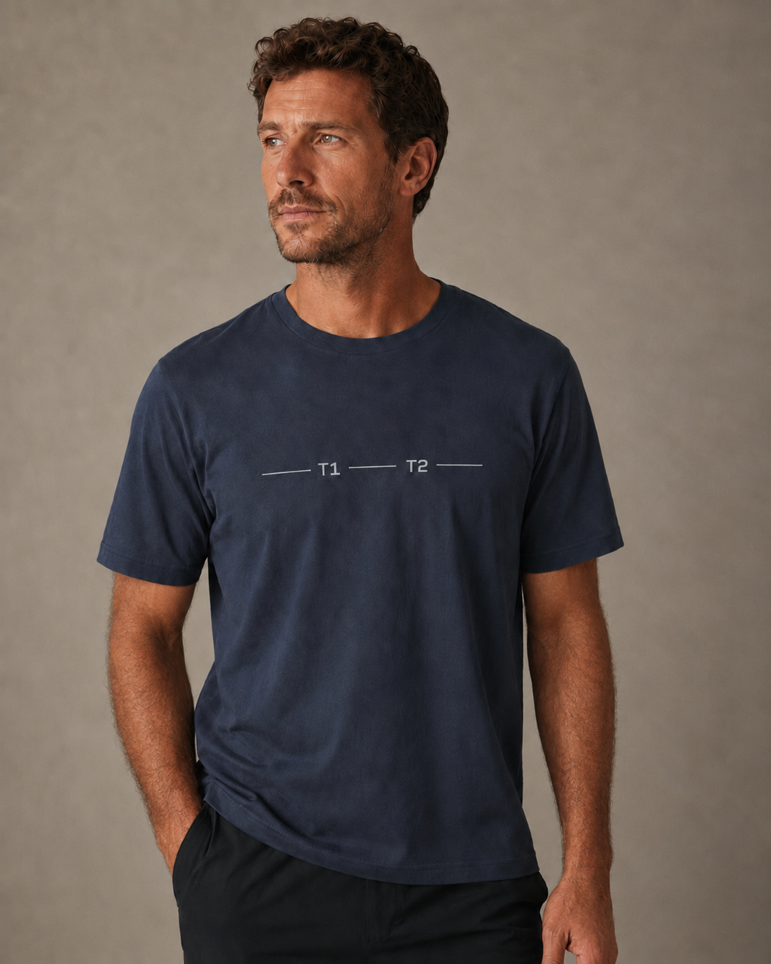 Male model wearing navy blue tshirt with graphic