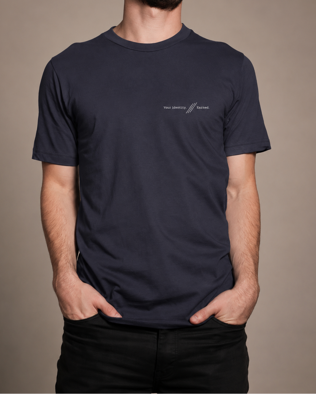 Male model wearing navy tshirt with graphic on chest